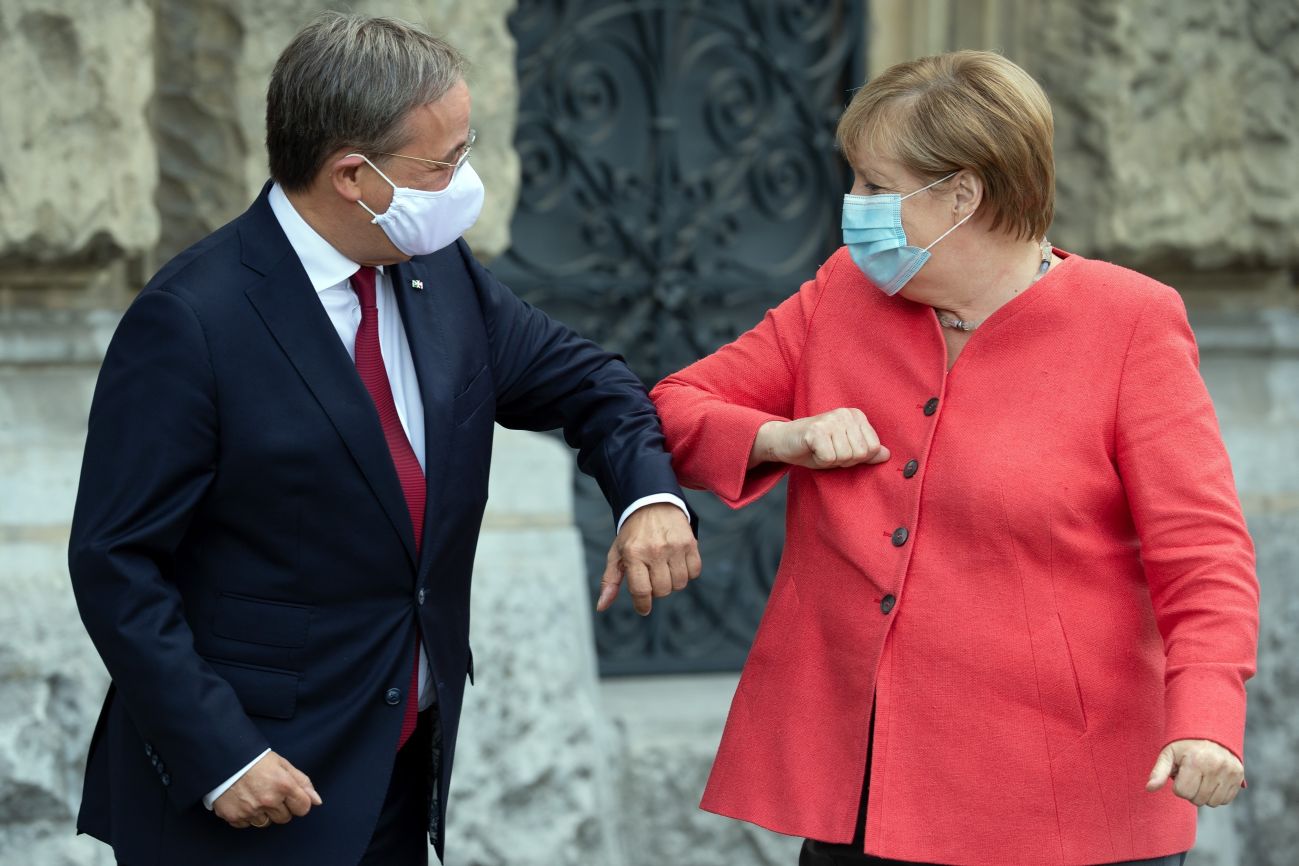 Лашет и Меркель: новый глава ХДС полностью разделяет взгляды канцлера.