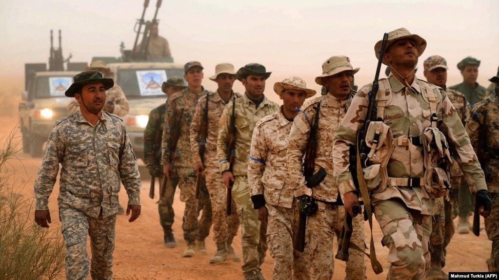 Одна из вооруженных группировок называет себя «Гвардия защиты нефтяных объектов». Бир аль-Ганам, март 2021 года