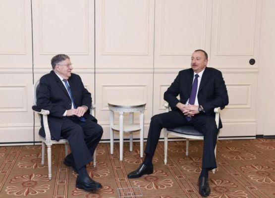 Дж. Сунуну и Ильхам Алиев