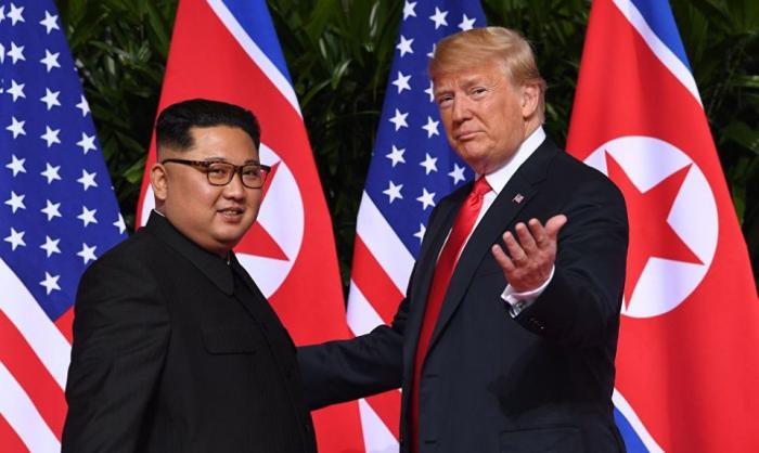 Дональд Трамп и Км Чен Ын